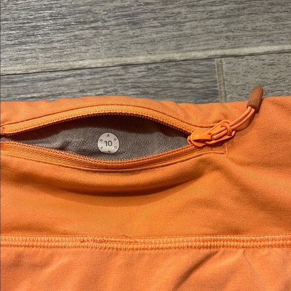 lululemon Speed Up Orange Shorts - Picture 6 of 10